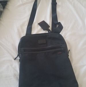 Tumi Satchel.  Laptop fits